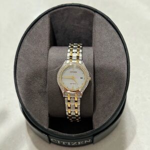 Citizen eco drive watch in 2 tone stainless steel. Excellent condition!